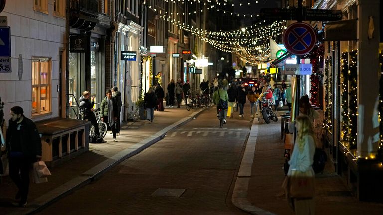 A quiet Amsterdam street after a day full of Christmas shopping. Pic: AP