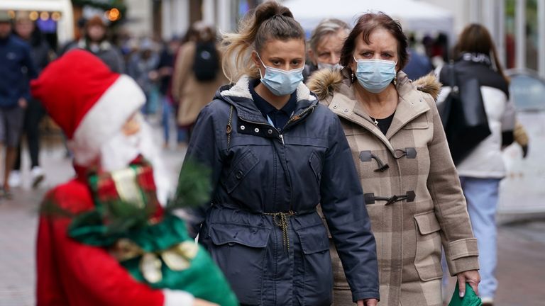 Shoppers wear masks in Canterbury, Kent, as further measures to contain the spread of the Omicron Covid-19 variant are enforced. Picture date: Tuesday November 30, 2021. 