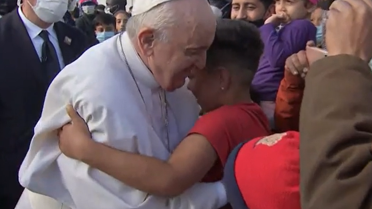 Pope Francis returned to the Greek island of Lesbos to offer comfort to migrants at a refugee camp.