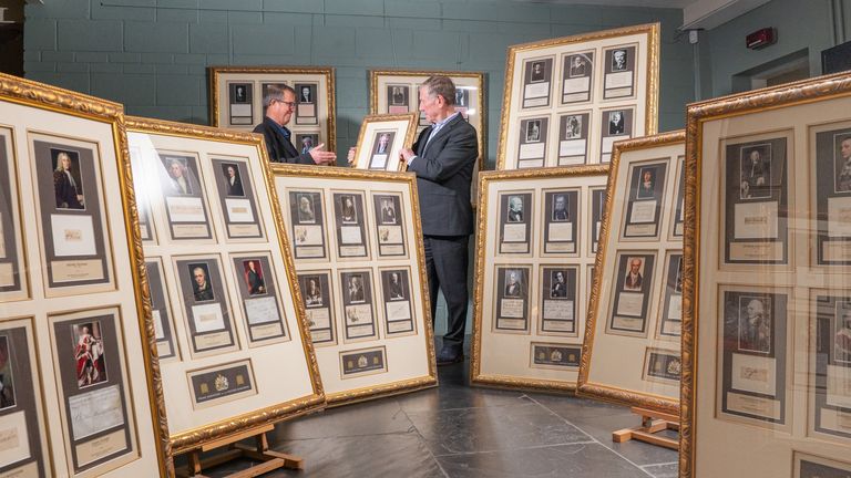 Undated handout photo issued by Advent Communications of Chris Albury (left) and Hamilton Bland with a framed collection of every signature of Great Britain&#39;s Prime Ministers