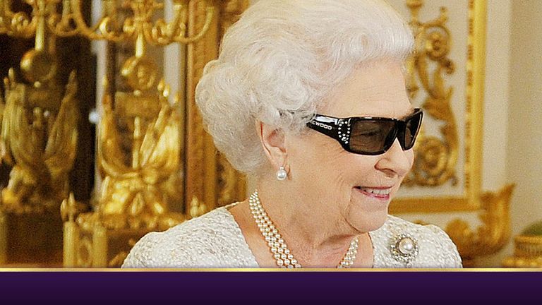Britain&#39;s Queen Elizabeth watches a preview of her Christmas message with a pair of 3D glasses, studded with Swarovski crystals in the form of a "Q", at Buckingham Palace in central London in a photo released December 24, 2012. The Queen will use her traditional Christmas Day message, filmed in 3D for the first time, to pay tribute to the world&#39;s athletes for delivering a "splendid summer of sport" at the London Olympics. REUTERS/John Stillwell/Pool  (BRITAIN - Tags: ENTERTAINMENT MEDIA POLITICS