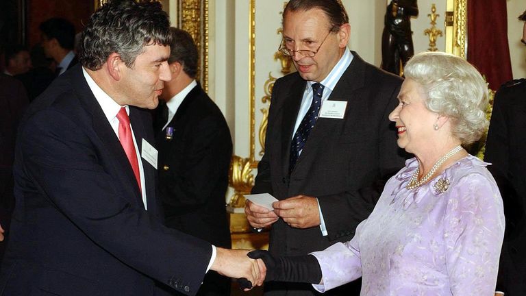 Britain&#39;s Queen Elizabeth II greets the Chancellor of the Exchequer Gordon Brown as he arrives at a reception for The Queen&#39;s Award for Enterprise at Buckingham Palace in Central London. The Queen&#39;s Award for Enterprise is the highest honour the Government can confer on a business. The Awards are presented in three categories: Innovation, International Trade and Sustainable Development.