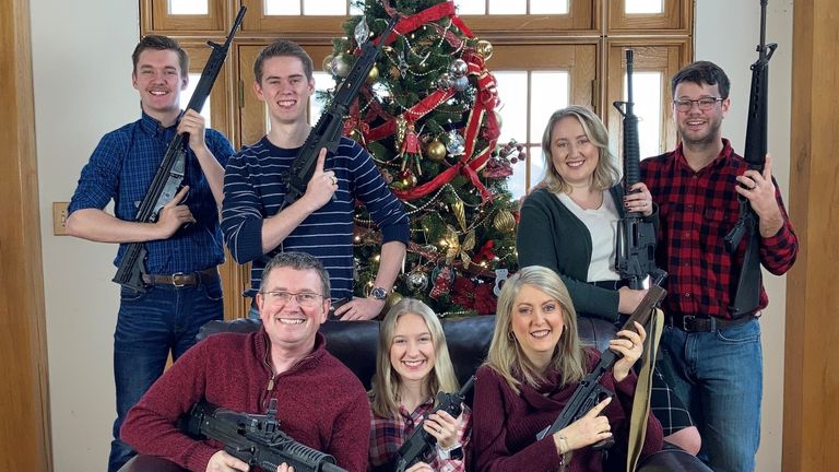 U.S. Rep. Thomas Massie (R-KY) in a Christmas photo of his family holding guns, in this image obtained from Twitter, posted on December 4, 2021. Courtesy of Twitter @REPTHOMASMASSIE / Social Media via REUTERS ATTENTION EDITORS - THIS IMAGE HAS BEEN SUPPLIED BY A THIRD PARTY. NO RESALES. NO ARCHIVE. MANDATORY CREDIT TWITTER @REPTHOMASMASSIE.
