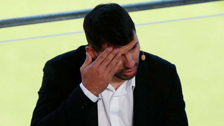 Sergio Aguero reacts after announcing his retirement from football during the press conference 