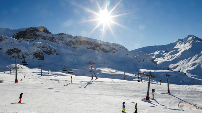 Skiers ski down the slope as ski season opens during the fourth national coronavirus disease (COVID-19) lockdown in Ischgl, Austria, December 3, 2021. REUTERS/Leonhard Foeger