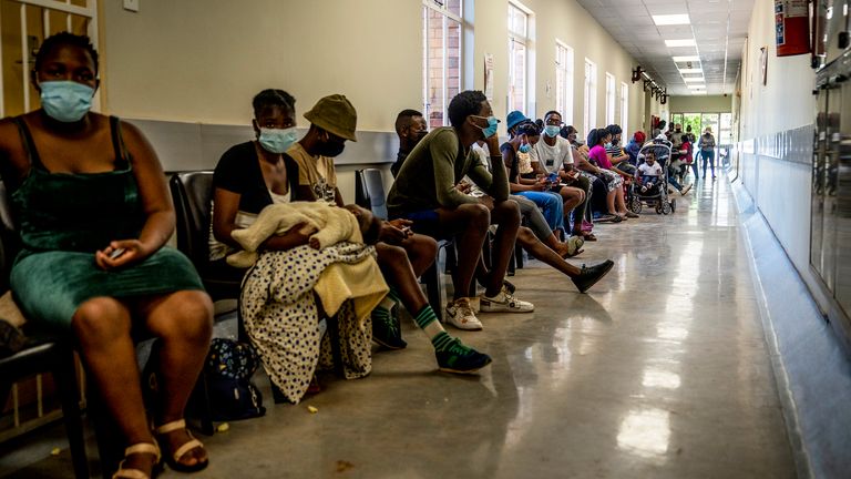 People queue to be vaccinated against COVID-19 at a hospital near Johannesburg, in the Omicron hotspot of Gauteng province, South Africa. Pic: AP