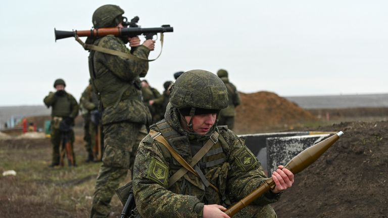 Russian grenade launcher operators take part in combat drills at the Kadamovsky range in the Rostov region, Russia December 14, 2021. REUTERS/Sergey Pivovarov