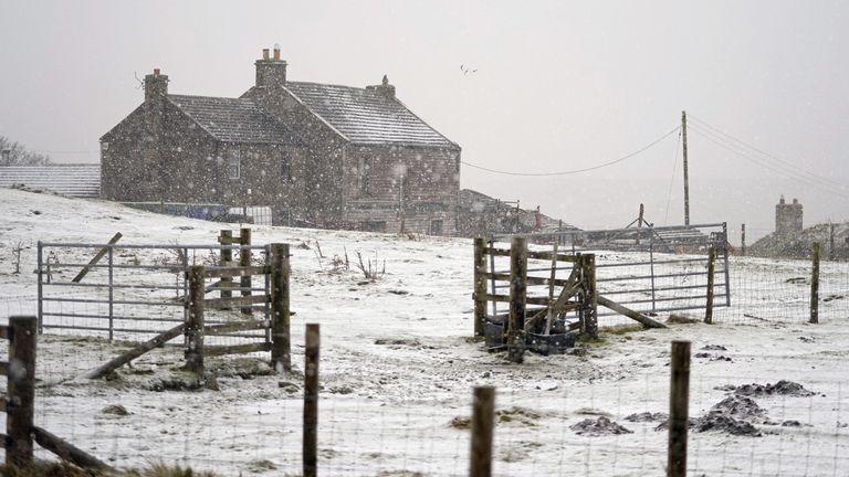 Snow falls near a farm building on the A66 between Stainmore and Bowes as Storm Barra hit the UK and Ireland with disruptive winds, heavy rain and snow on Tuesday. Picture date: Tuesday December 7, 2021.
