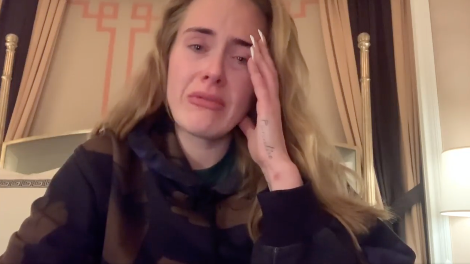 Adele in tears as she is forced to reschedule Las Vegas residency