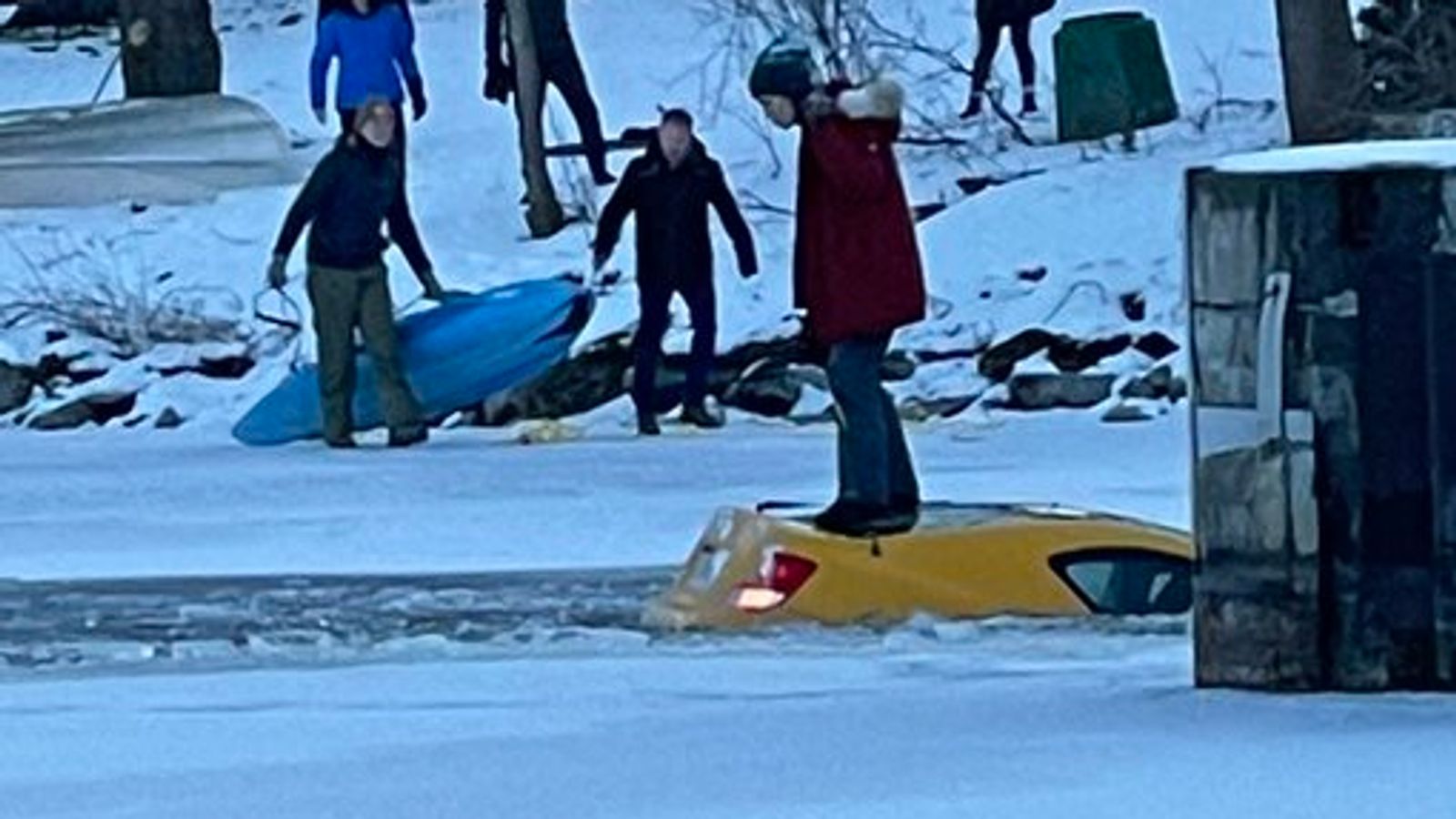 Canada: Woman rescued using kayaks after car crashes through ice on frozen river