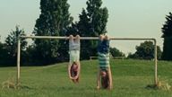 The Dairylea advert which shows two girls hanging upside down from a football goal while eating cheese