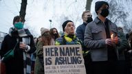 One mourner carries a placard that reads &#39;her name is Ashling&#39; outside the London Irish Centre