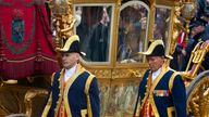 ootmen walk alongside the Golden Carriage as Netherlands&#39; King Willem-Alexander and Queen Maxima arrive at Noordeinde Palace, after the King officially opened the new parliamentary year in The Hague, Netherlands, Tuesday Sept. 17, 2013