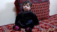 Baby Sohail Ahmadi sits inside the house of Hamid Safi, a taxi driver who had found Sohail in the airport, in Kabul, Afghanistan, January 7, 2022. Picture taken January 7, 2022. REUTERS/Ali Khara
