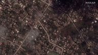 Satellite image shows homes and buildings in Tonga covered in ash on 18 January, 2022. Pic: ©2022 Maxar Technologies