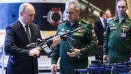 Russian President Vladimir Putin and Defence Minister Sergei Shoigu during a military exhibition in December 2021 (file pic)