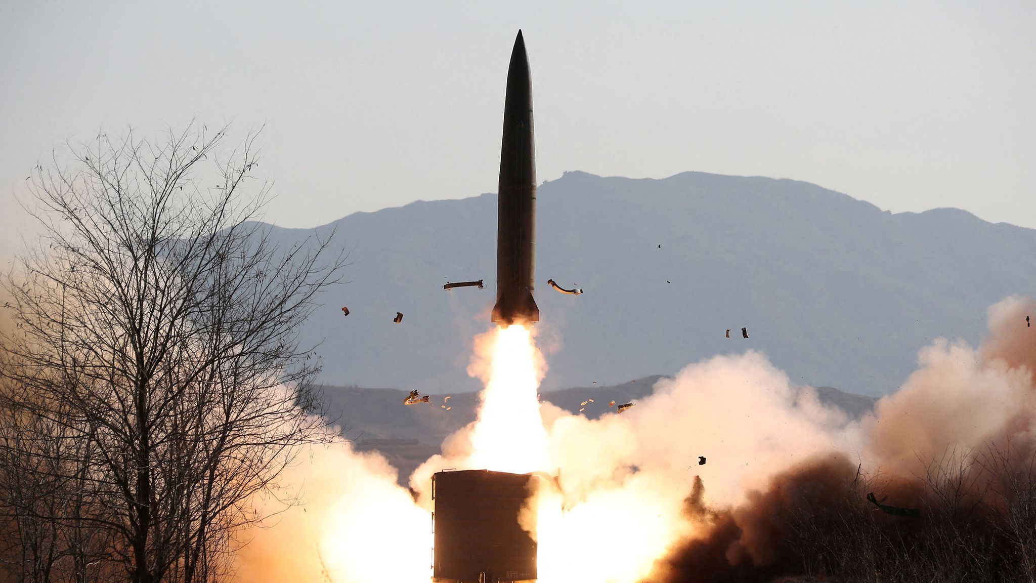 A missile is launched during firing drills at an undisclosed location in No...