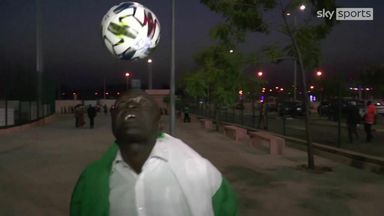 Nigeria fan correctly predicts score while doing headed keep-ups!