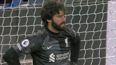 Alisson makes diving stop