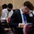 Pupils at The Fulham Boys School take a mock exam on the first day after the Christmas holidays following a government announcement that face masks are to be worn in English secondary schools amid the coronavirus disease (COVID-19) outbreak in London, Britain, January 4, 2022. REUTERS/Kevin Coombs