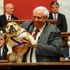 Governor raises dog's backside in air and tells Bette Midler to 'kiss her hiney!'