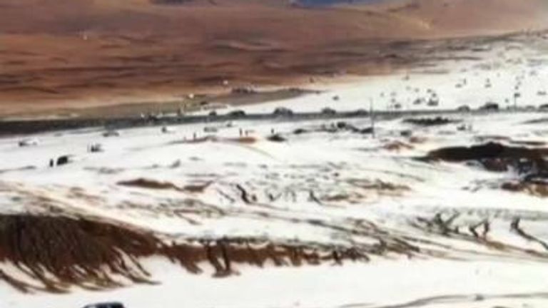 Sand dunes covered in snow after rare hail storm hits Saudi Arabia
