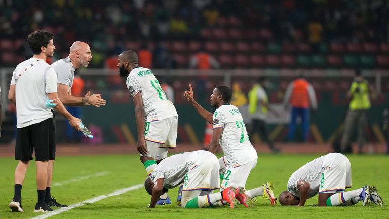 Comoros&#39; Youssouf M&#39;Changama, center, with teammates celebrates scoring his side&#39;s first goal during the African Cup of Nations 2022 round of 16 soccer match between Cameroon and Comoros at the Olembe stadium in Yaounde, Cameroon, Monday, Jan. 24, 2022. (AP Photo/Themba Hadebe)




