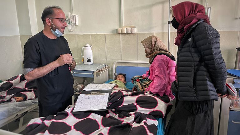 Doctor Mohammad Aqel Halimee from Herat Hospital burns unit talks to Alex Crawford. Pic: Chris Cunningham