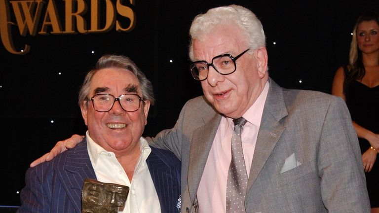 Ronnie Corbett (left) receives the TRIC Special Award, during the ceremony, with Barry Cryer at the 2005 TRIC (Television & Radio Industries Club) Awards at Grosvenor House in London&#39;s Park Lane Tuesday 8 March 2005. Watch for PA story. PRESS ASSOCIATION Photo. Photo credit should read: Yui Mok/PA.