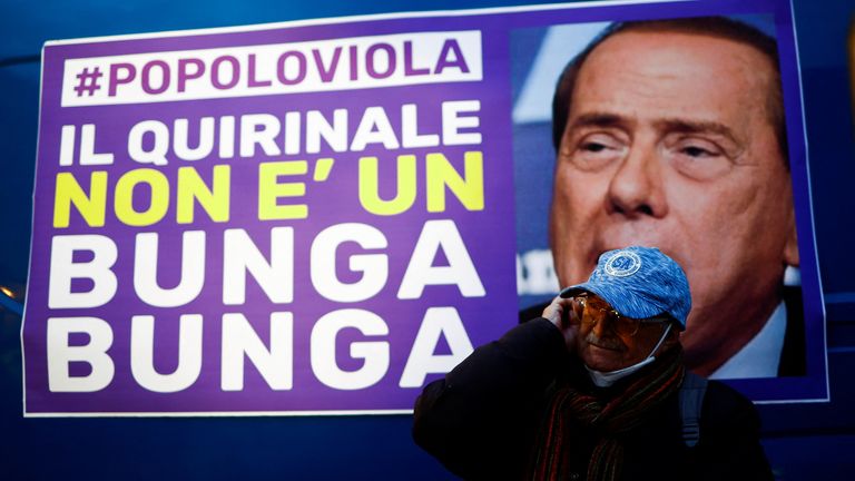 Anti-Berlusconi protesters hold demonstration against former PM&#39;s bid for Italian presidency in Rome
