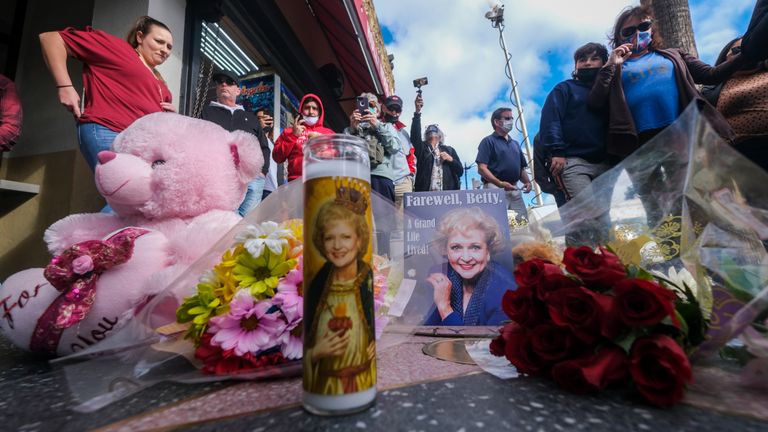 Flowers and candles on White&#39;s star on the Hollywood Walk of Fame in Los Angeles