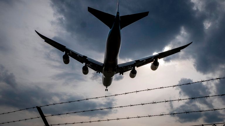 A Boeing 747 airplane lands at the airport in Frankfurt, Germany, Monday, May 3, 2021. (AP Photo/Michael Probst)