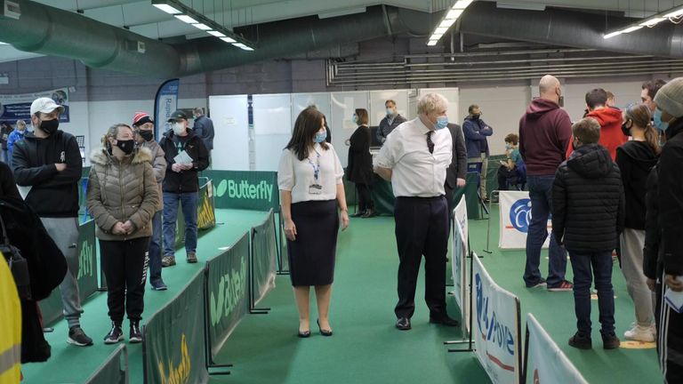 Boris Johnson met staff and people queuing for their vaccinations at the centre in Aylesbury, Buckinghamshire