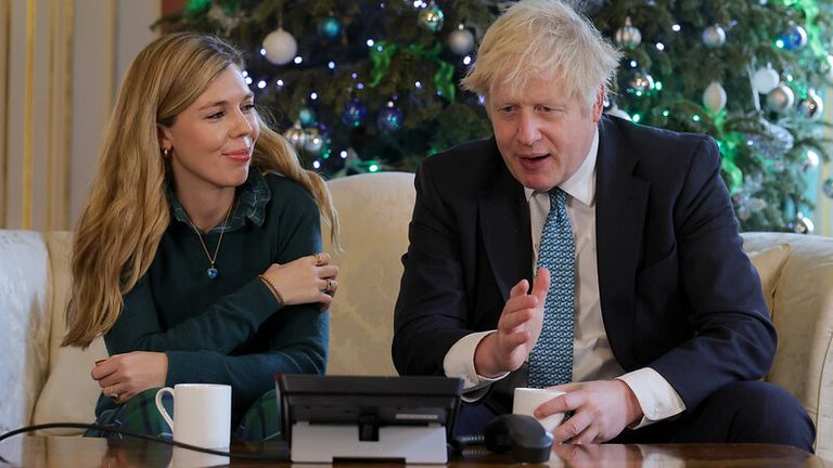 22/12/2020. London, United Kingdom. Boris Johnson and Carrie Symonds Call Mary Beggs-Reid. The Prime Minister Boris Johnson and his partner Carrie Symonds call Mary Beggs-Reid from inside No10 Downing Street, Mary has come up with the Christmas Eve Jingle idea to help combat loneliness at Christmas. Pic: Andrew Parsons /Downing St