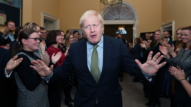 Prime Minister Boris Johnson is greeted by staff as he arrives back at 10 Downing Street, London, after meeting Queen Elizabeth II and accepting her invitation to form a new government after the Conservative Party was returned to power in the General Election with an increased majority.
Read less
Picture by: Stefan Rousseau/PA Archive/PA Images
Date taken: 13-Dec-2019