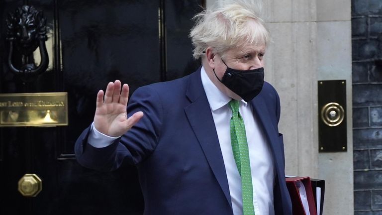 Prime Minister Boris Johnson leaves 10 Downing Street, London, to attend Prime Minister&#39;s Questions at the Houses of Parliament. Picture date: Wednesday January 19, 2022.