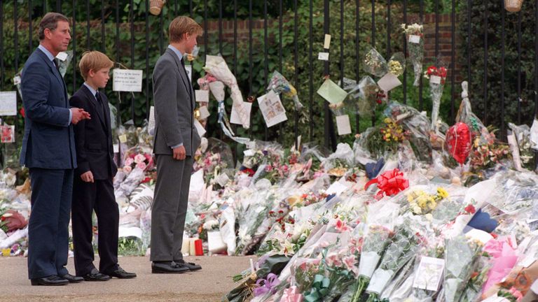 Charles, Harry and William view tributes left for Diana