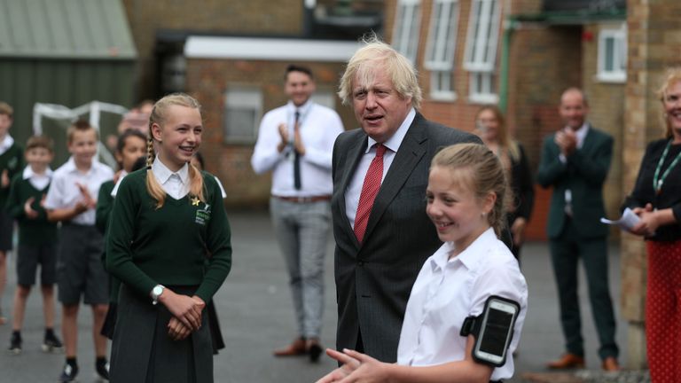British Prime Minister Boris Johnson joins a socially distanced lesson during a visit to Bovingdon Primary School, following the announcement of a GBP 1 billion plan to help pupils catch up with their education before September after spending months out of school during the coronavirus lockdown, in Bovingdon, Hemel Hempstead, Hertfordshire, Britain June 19, 2020. Steve Parsons/Pool via REUTERS