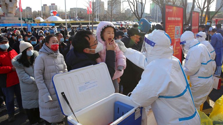 People queue for a test in Beijing amid continuing worries over coronavirus and the omicron variant. Pic: AP