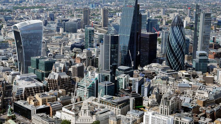 An aerial view of the City of London, including 20 Fenchurch Street referred to as the Walkie-Talkie (left) and 30 St Mary Axe, more commonly known as the Gherkin Picture date: Thursday August 28, 2014.  