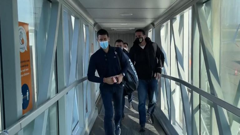 Djokovic lands after being sent home from Australia.