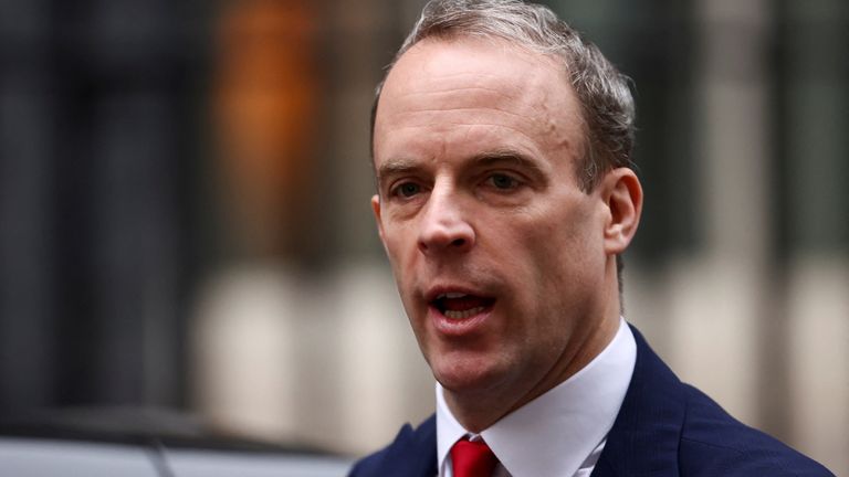 British Deputy Prime Minister and Justice Secretary Dominic Raab walks outside Downing Street in London, Britain, January 25, 2022. REUTERS/Henry Nicholls
