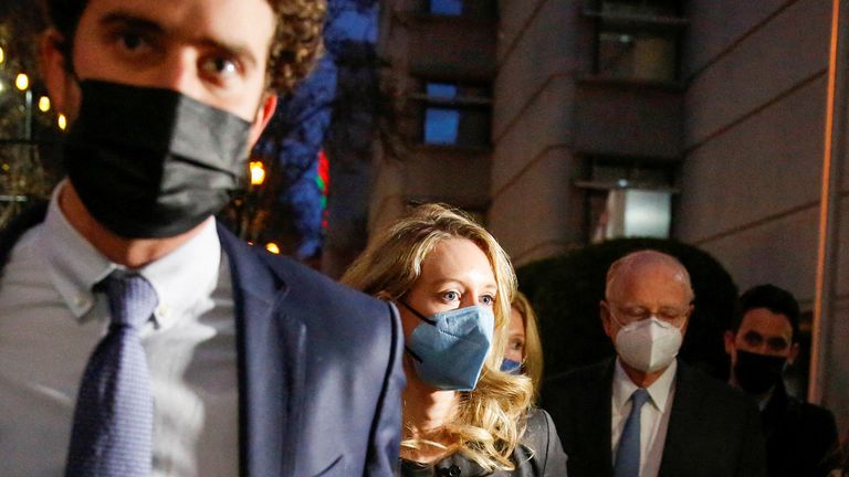 Theranos founder Elizabeth Holmes and her family leave the federal court after a U.S. jury found Holmes guilty in her fraud trial, in San Jose, California, U.S. January 3, 2022. REUTERS/Brittany Hosea-Small TPX IMAGES OF THE DAY