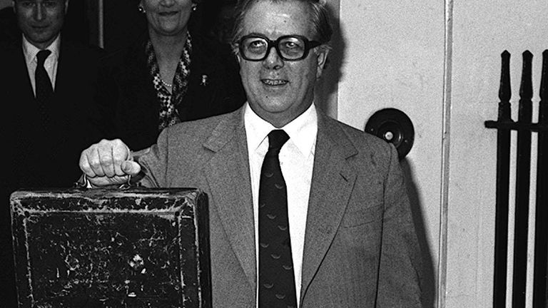 The Chancellor of the Exchequer, Sir Geoffrey Howe, holding up the traditional despatch budget box as he leaves 11 Downing Street to present his budget to the Houses of Parliament 10/3/1981