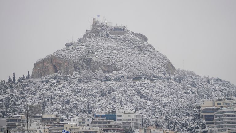 The city of Athens with the Lycabettus hill is covered with snow during a snowfall, on Monday, Jan. 24, 2022.The wave of bad weather hitting Greece is forecast to continue through Tuesday, and has seen snow falling even on some islands. Authorities have warned the public to avoid all but essential outdoor movement, and several major roads and highways are passable only with snow chains. (AP Photo/Thanassis Stavrakis)
PIC:AP

