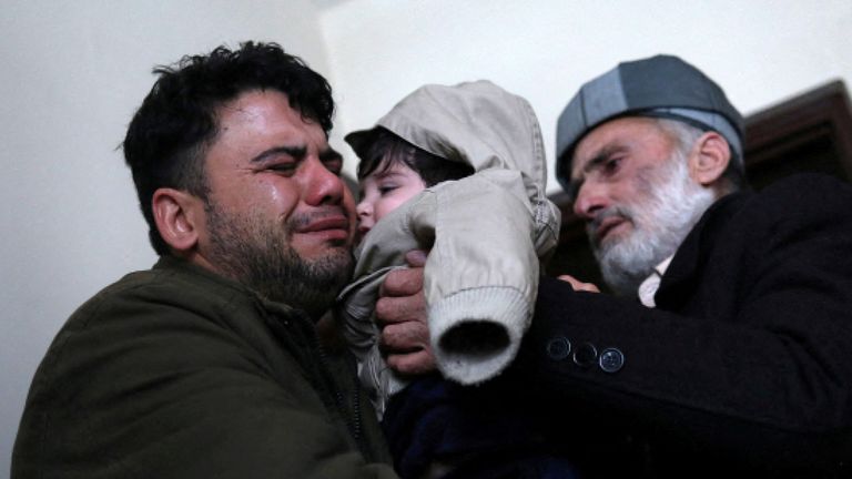 Hamid Safi cried while handing Sohail over to his grandfather Mohammad Qasem Razawi