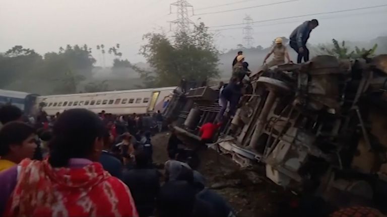 This image from video shows rescuers looking inside derailed coaches after a passenger train derailed in Jalpaiguri, West Bengal state, Thursday, Jan.13, 2022. At least three people died and more than 25 were injured. (K K Productions via AP)
Pic:AP


