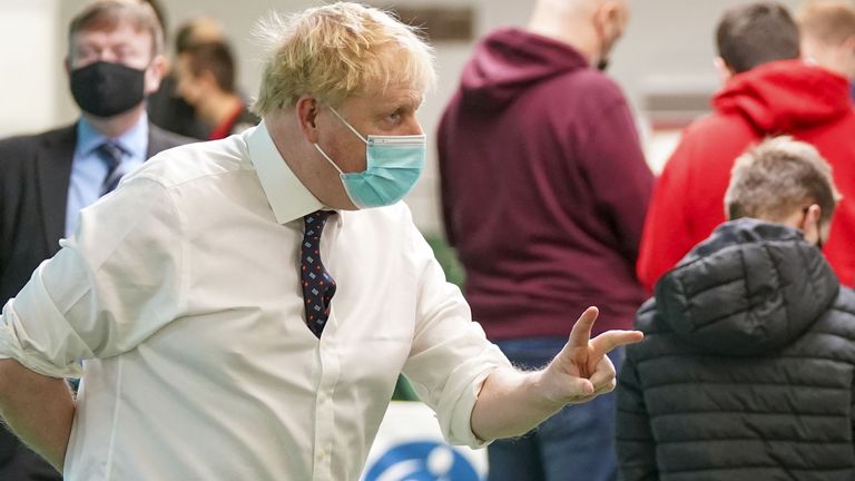 Prime Minister Boris Johnson during a visit to a vaccination center at the Guttman Center at Stoke Mandeville Stadium in Aylesbury