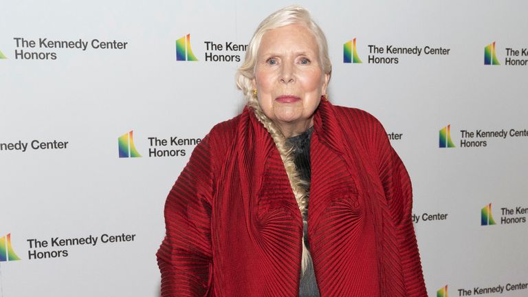 2021 Kennedy Center honoree singer-songwriter Joni Mitchell poses on the red carpet at the Medallion Ceremony for the 44th Annual Kennedy Center Honors on Saturday, Dec. 4, 2021, at the Library of Congress in Washington. (AP Photo/Kevin Wolf)