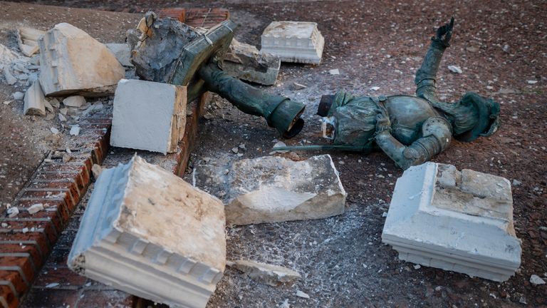 The statue, in Plaza San Jose in San Juan, was left in pieces